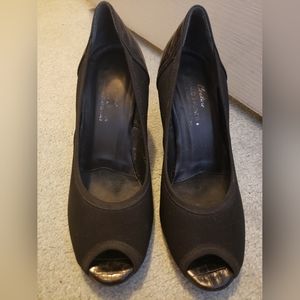 A pair of black Donald J Pliner heels